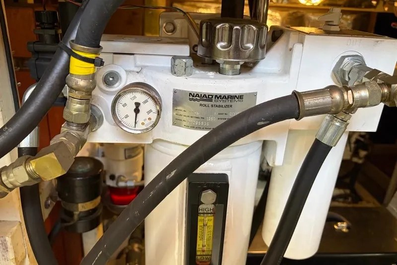 Slide: The Image of Naiad Marine roll stabilizer system on a 1979 Grand Banks 42 Europa yacht. - 54