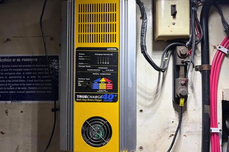 Slide: The Image of Battery charger in a 1979 Grand Banks 42 Europa boat engine room. - 57
