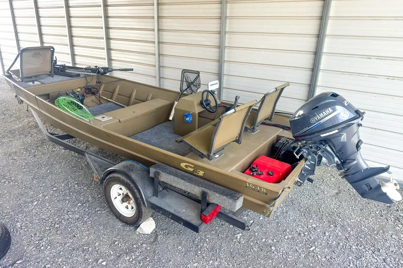 Slide: The Image of 2022 G3 1648 LW boat with Yamaha outboard motor on trailer in storage. - 11