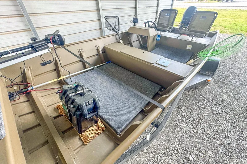 Slide: The Image of 2022 G3 1648 LW boat interior with fishing gear and equipment in storage shed. - 18