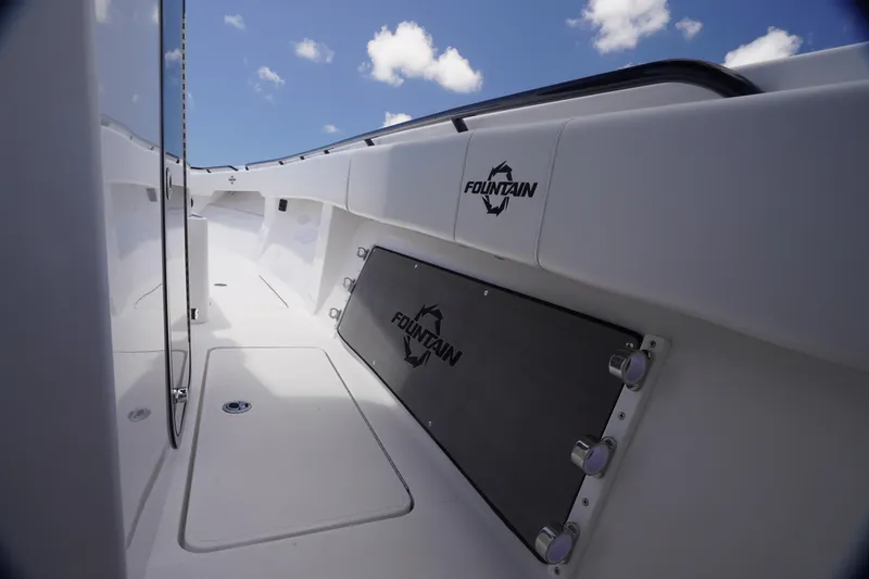Slide: The Image of 2023 Fountain 38 Tournament Edition boat interior with sleek design and branding. - 23