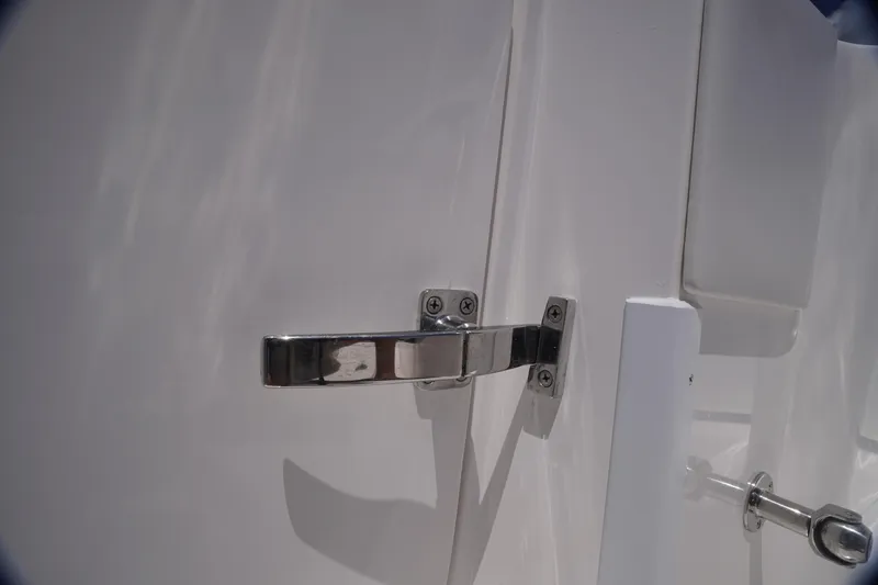 Slide: The Image of Close-up of a 2023 Fountain 38 Tournament Edition boat latch handle. - 27