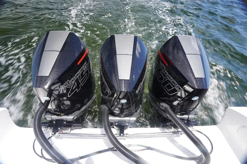 Slide: The Image of Triple Mercury Racing outboard engines on 2023 Fountain 38 Tournament Edition boat. - 31