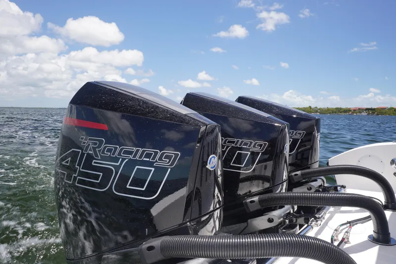 Slide: The Image of Triple Mercury Racing 450 engines on a 2023 Fountain 38 Tournament Edition boat. - 33