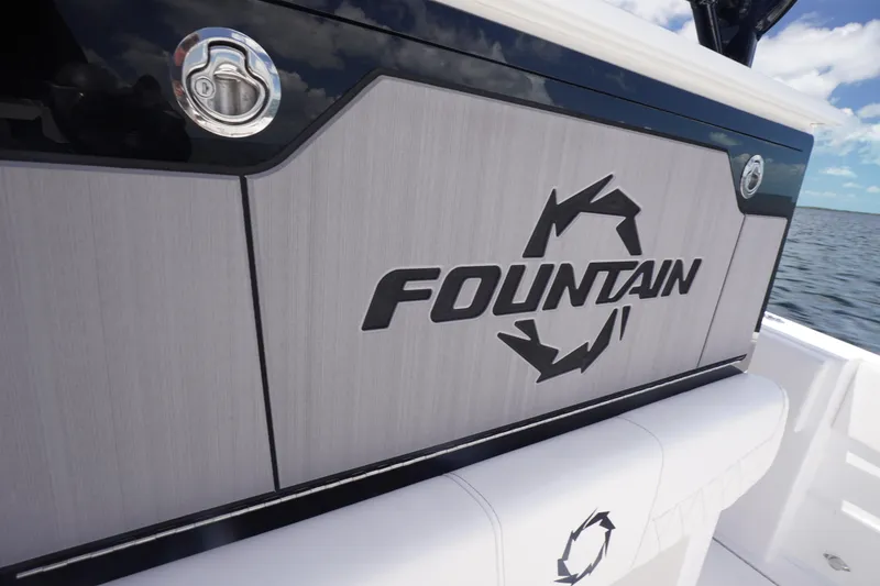 Slide: The Image of 2023 Fountain 38 Tournament Edition boat logo detail on sleek paneling. - 37