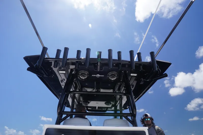 Slide: The Image of 2023 Fountain 38 Tournament Edition boat, viewed from below, against a clear blue sky. - 41