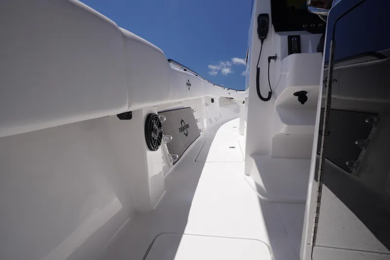 Slide: The Image of 2023 Fountain 38 Tournament Edition boat interior with sleek white design and modern features. - 44