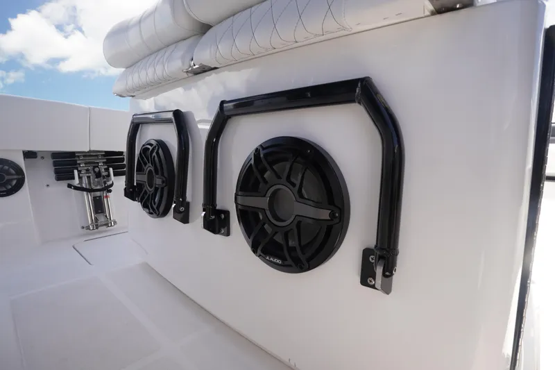 Slide: The Image of 2023 Fountain 38 Tournament Edition boat speakers and seating detail under clear sky. - 47