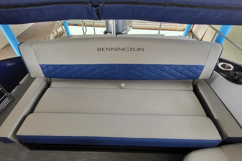 Slide: The Image of 2023 Bennington L 25 Swingback boat seat with blue and gray upholstery. - 13