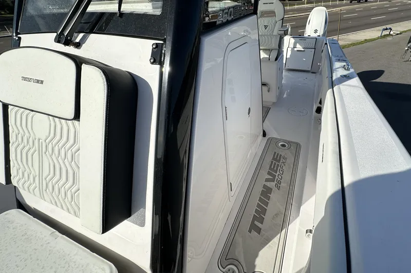 Slide: The Image of 2026 Twin Vee 260 GFX2 CC boat interior with sleek seating and modern design. - 21
