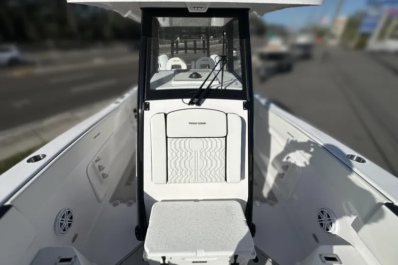 Slide: The Image of 2026 Twin Vee 260 GFX2 CC boat interior with modern seating and console design. - 23