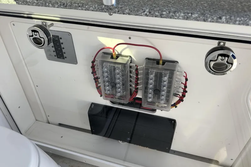 Slide: The Image of Electrical panel of 2026 Twin Vee 260 GFX2 CC boat with wiring and switches. - 26