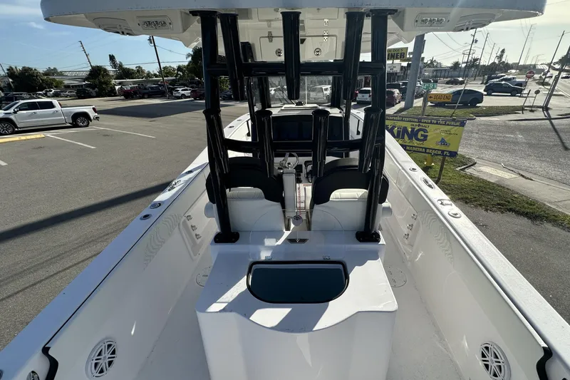 Slide: The Image of 2026 Twin Vee 260 GFX2 CC boat interior with modern console and seating. - 7