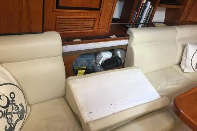 Slide: The Image of Luxurious interior of 1997 Gorbon Custom 66 yacht with cream leather seating. - 127