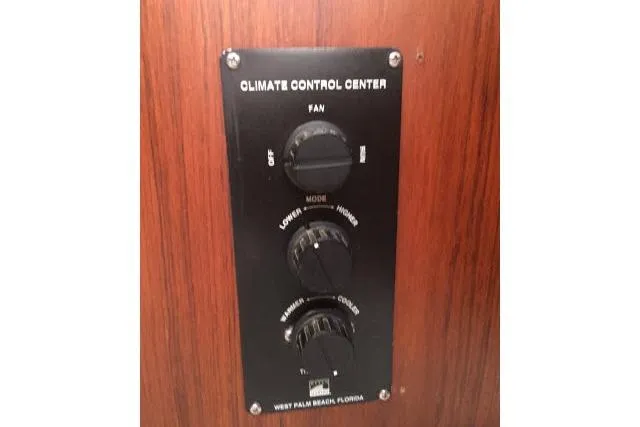 Slide: The Image of Climate control panel on 1997 Gorbon Custom 66 yacht, featuring fan and temperature settings. - 162