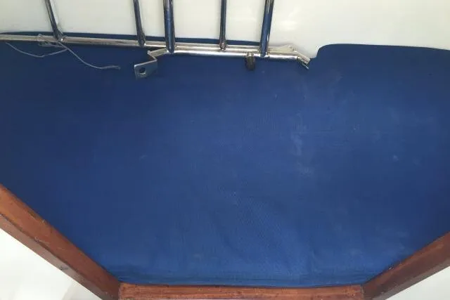 Slide: The Image of Blue cushioned seat with metal railing, Gorbon Custom 66, 1997 model. - 182