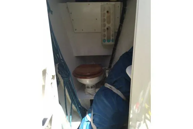 Slide: The Image of Interior of 1997 Gorbon Custom 66 yacht showing compact bathroom space. - 185