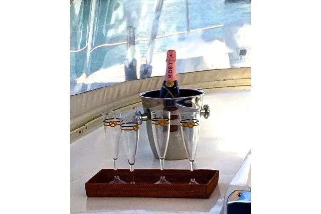 Slide: The Image of Champagne and glasses on Gorbon Custom 66 yacht, 1997 model, with ocean view. - 189