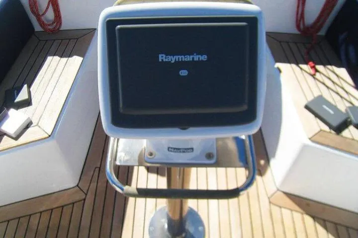 Slide: The Image of Raymarine navigation system on 1997 Gorbon Custom 66 yacht with teak deck. - 202