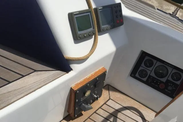 Slide: The Image of Control panel of a 1997 Gorbon Custom 66 yacht with navigation instruments. - 206