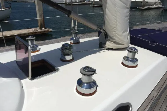 Slide: The Image of Deck of 1997 Gorbon Custom 66 yacht with winches and open hatch. - 215