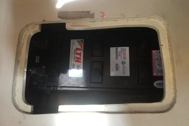 Slide: The Image of Battery compartment of a 1997 Gorbon Custom 66 boat. - 229