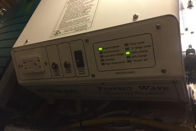Slide: The Image of Control panel of a Gorbon Custom 66, 1997 model, showing status indicators and switches. - 232