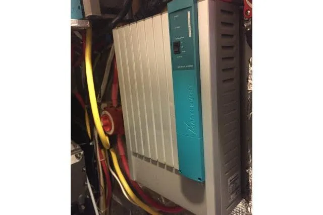 Slide: The Image of Electrical panel with colorful wiring in a Gorbon Custom 66, 1997 model. - 233