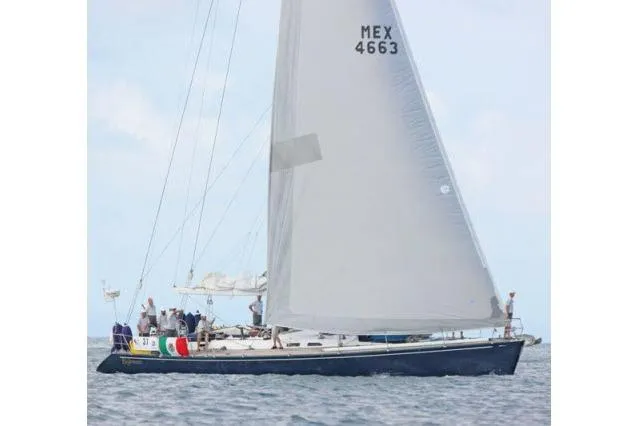 Slide: The Image of Sailing yacht Gorbon Custom 66, 1997 model, on open water with crew onboard. - 248
