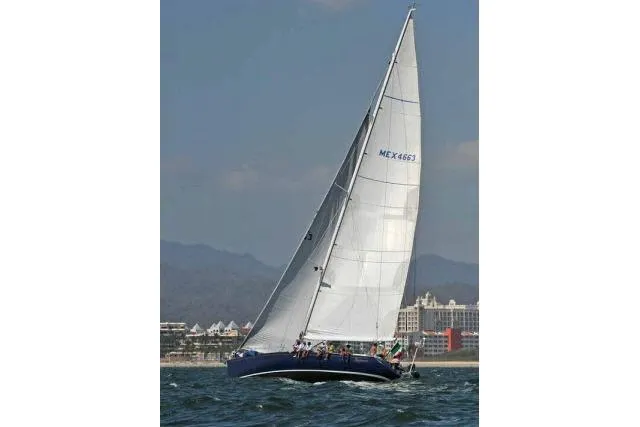Slide: The Image of Sailing yacht Gorbon Custom 66, 1997 model, on open water with crew onboard. - 251