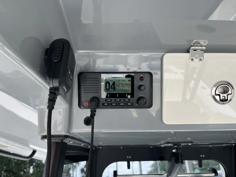 Slide: The Image of Garmin radio installed on 2026 Cobia 320 Center Console. - 15