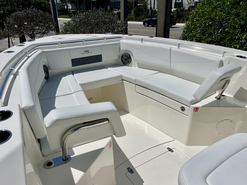 Slide: The Image of Interior of 2026 Cobia 320 Center Console with white seating. - 25