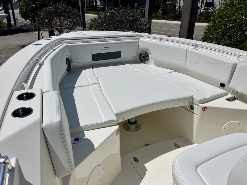 Slide: The Image of Luxurious seating area on Cobia 320 Center Console 2026 boat. - 22