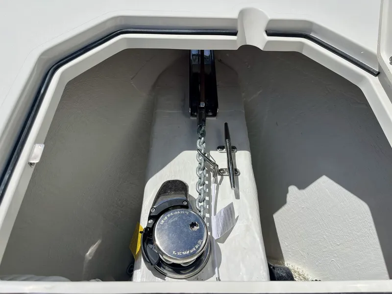 Slide: The Image of Anchor locker of the 2026 Cobia 320 Center Console. - 21