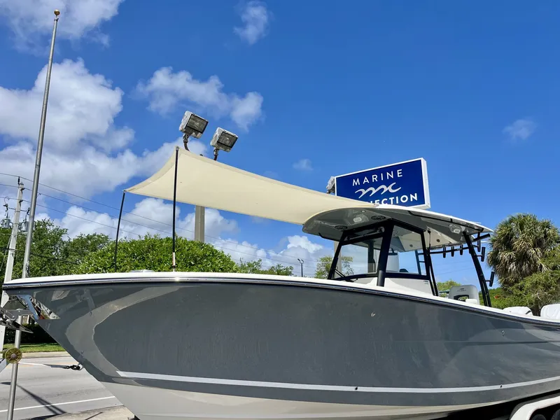 Slide: The Image of 2026 Cobia 320 Center Console boat at Marine Connection. - 38