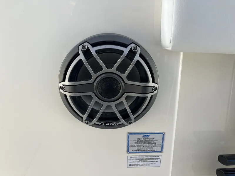 Slide: The Image of JL Audio speaker on Cobia 320 Center Console 2026. - 17