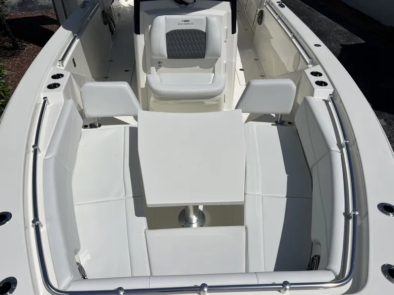 Slide: The Image of Interior of 2026 Cobia 320 Center Console with seating area. - 20