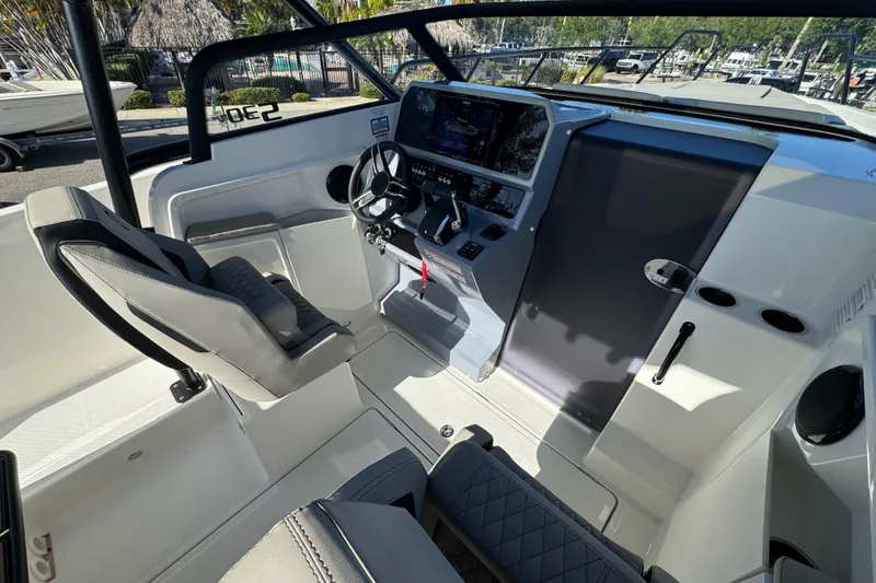 Slide: The Image of Interior of 2026 Navan S30 boat with modern steering and control panel. - 10