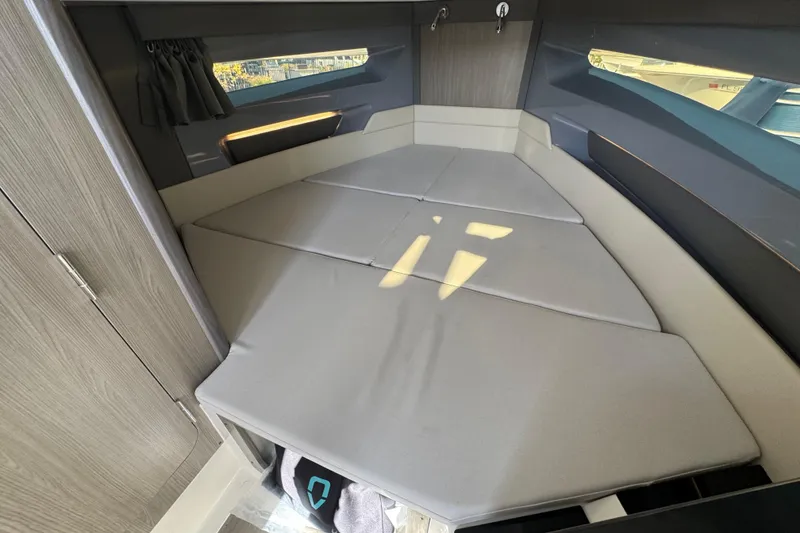 Slide: The Image of Interior cabin of 2026 Navan S30 boat with cushioned seating and modern design. - 20