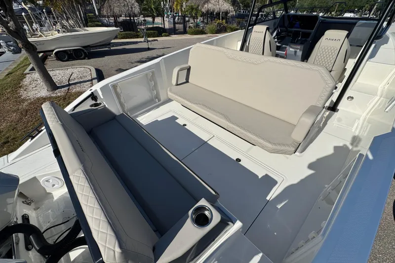 Slide: The Image of 2026 Navan S30 boat interior with beige seating and modern dashboard design. - 7