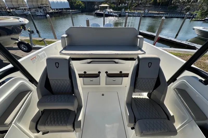 Slide: The Image of Interior of 2026 Navan S30 boat with modern seating and waterfront view. - 9