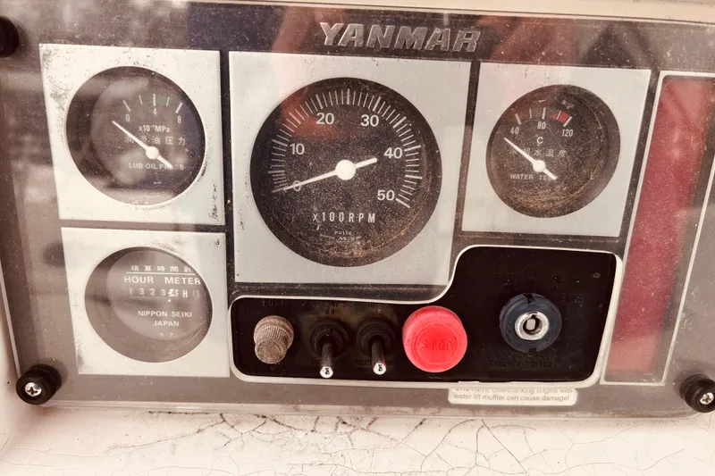 Slide: The Image of Control panel of a 2004 Sabre 426 with Yanmar engine gauges and hour meter. - 20