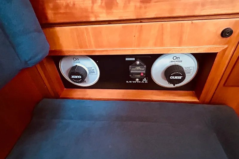 Slide: The Image of Control panel in a 2004 Sabre 426 yacht with Lewmar and Guest switches. - 48