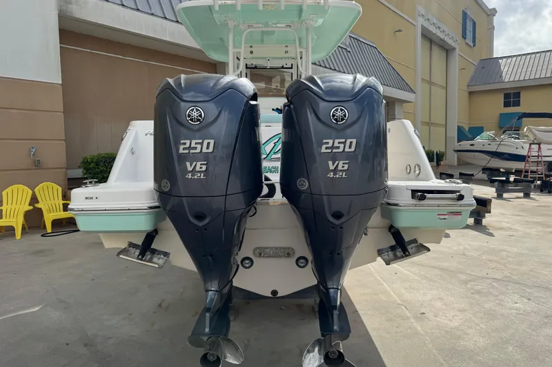 Slide: The Image of 2023 Robalo R272 Center Console with twin Yamaha 250 V6 outboard engines. - 3