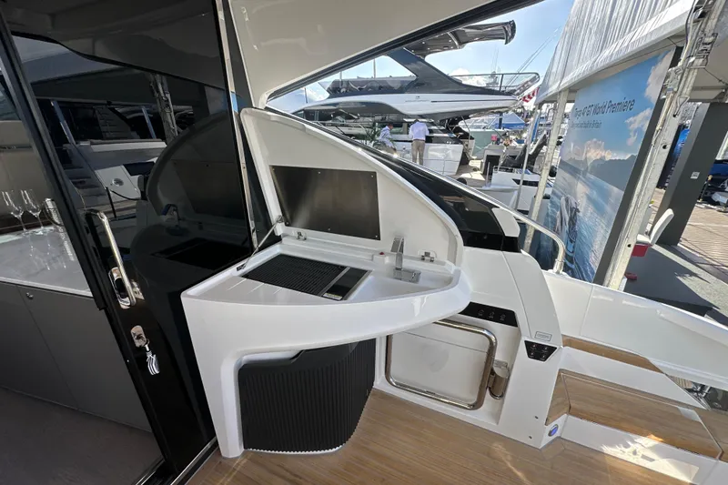 Slide: The Image of 2026 Fairline Targa 47 GT yacht interior with modern amenities and sleek design. - 16