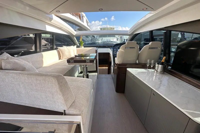 Slide: The Image of Luxurious interior of 2026 Fairline Targa 47 GT yacht with elegant seating and modern amenities. - 18