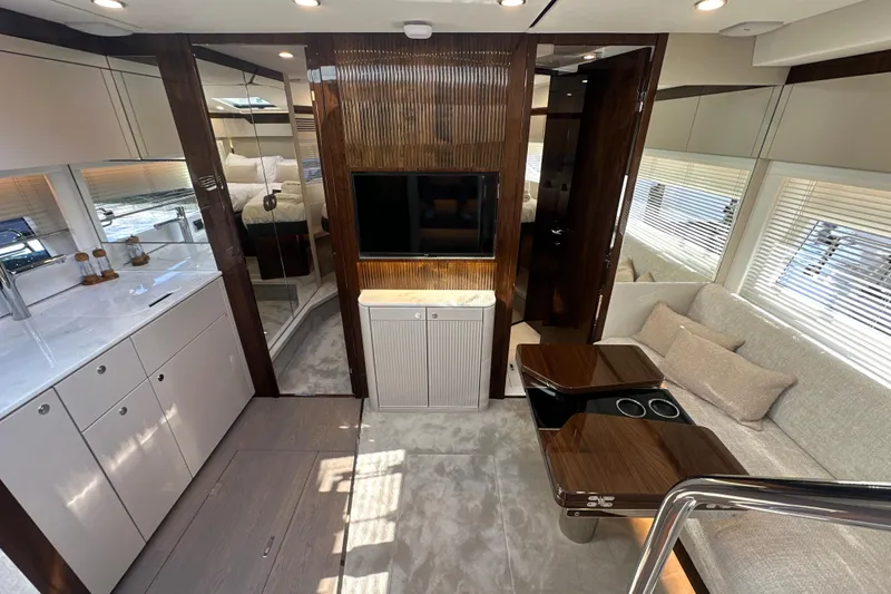 Slide: The Image of Luxurious interior of 2026 Fairline Targa 47 GT yacht with modern furnishings and sleek design. - 25