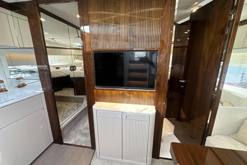 Slide: The Image of Luxurious interior of 2026 Fairline Targa 47 GT yacht with modern wood finishes. - 27
