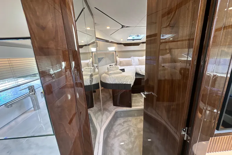 Slide: The Image of Luxurious interior of 2026 Fairline Targa 47 GT yacht with elegant wood finishes. - 29