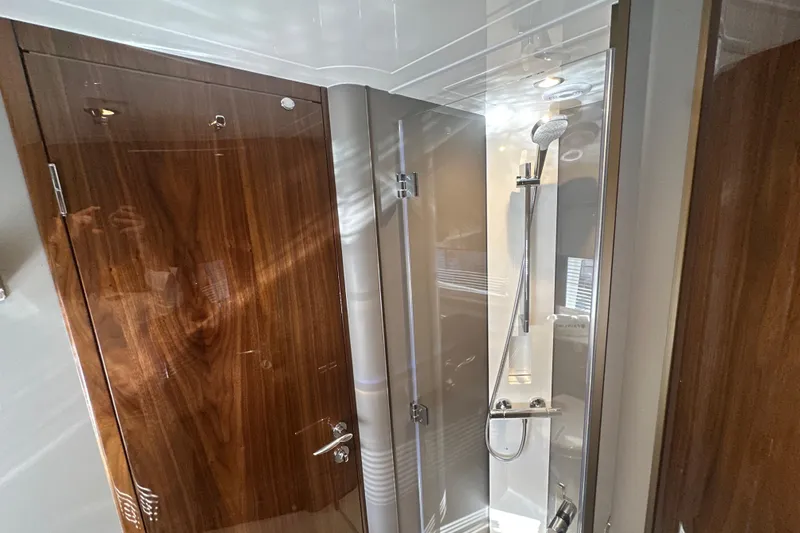 Slide: The Image of Luxurious bathroom interior of 2026 Fairline Targa 47 GT yacht with sleek shower design. - 34